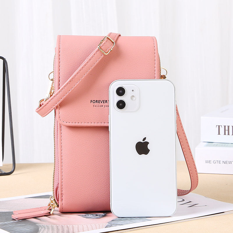 Multifunctional shoulder bag with touchscreen phone compartment