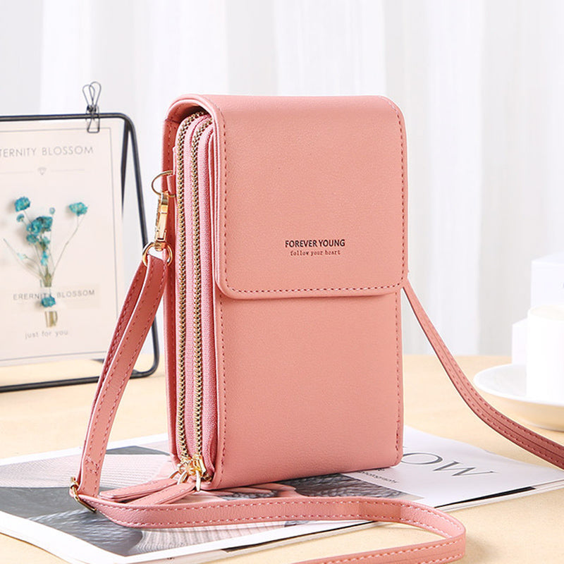 Multifunctional shoulder bag with touchscreen phone compartment